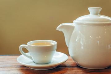 cup of tea on the wood desk