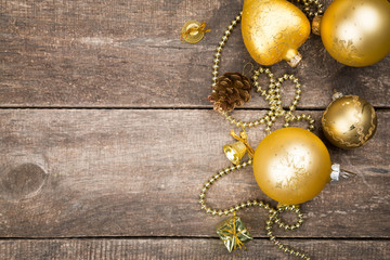 Christmas background with decorations on wooden board