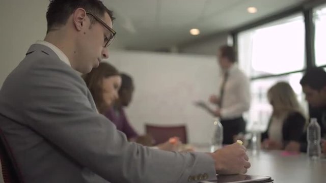 Group of attractive professionals involved in meeting