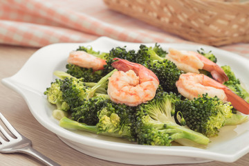 Stir fried broccoli with shrimp on plate