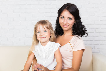 Mother and daughter spending time together at home