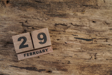 cube calendar for february on wooden background