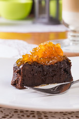 Chocolate cake with orange jam topping