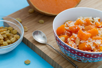 Pumpkin rice porridge with raisins 