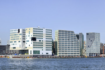 Modern architecture located at the embankment of the 'IJ', close to the Amsterdam Central Station