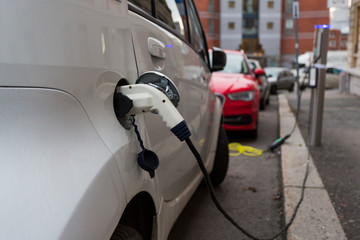 White electric car charging