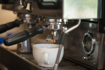 preparing coffee in cafe