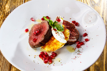 Steak Chateaubriand with potato cutlet and cream fraiche.