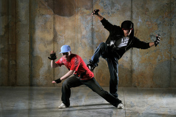 Two hip-hop dancers performing