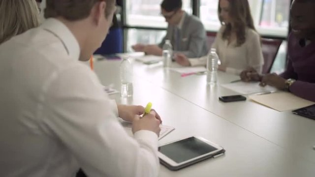 Group of attractive professionals involved in meeting
