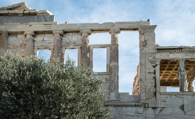 Fototapeta premium Ruins of the Erechtheum atop the Acropolis at Athens, Greece