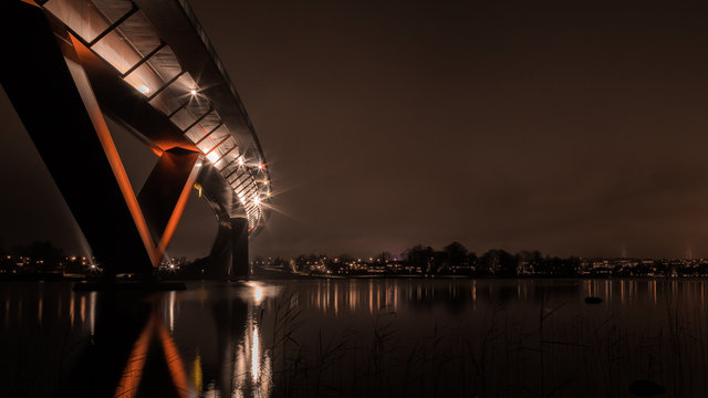 Red bridge at night