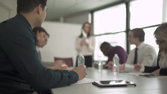 Group of attractive professionals involved in meeting