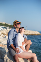 happy young romantic couple in love have fun on beautiful beach