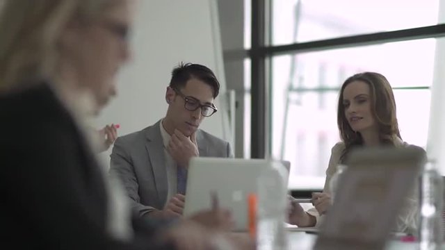 Group of attractive professionals involved in meeting