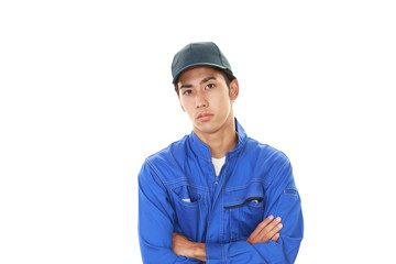 疲れた表情の労働者