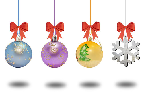 Several christmas decorative ball with bow on white background