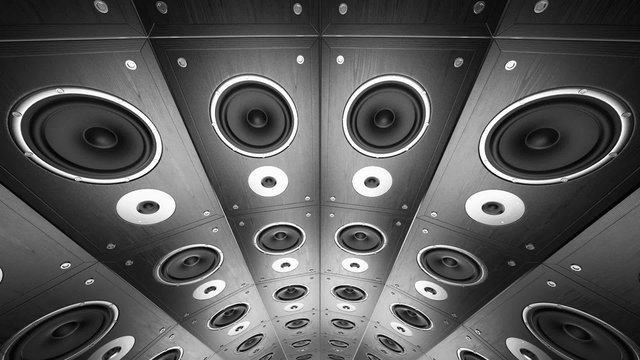 Endless rotation around the huge circular wall of active speakers. Loopable. HD