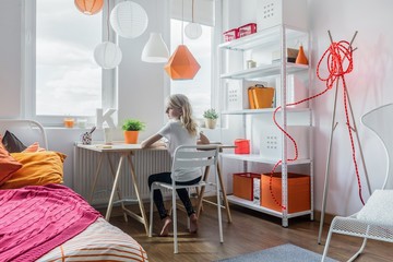 Schoolgirl sitting at the desk