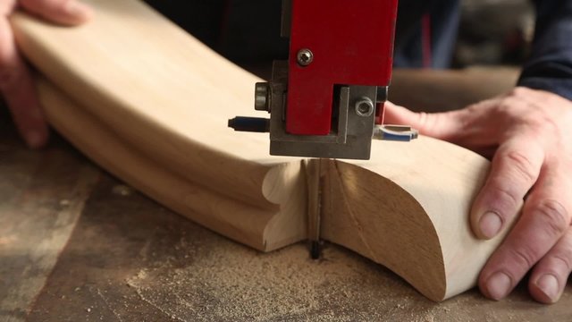 Carpenter manufactures furniture parts to machine tool