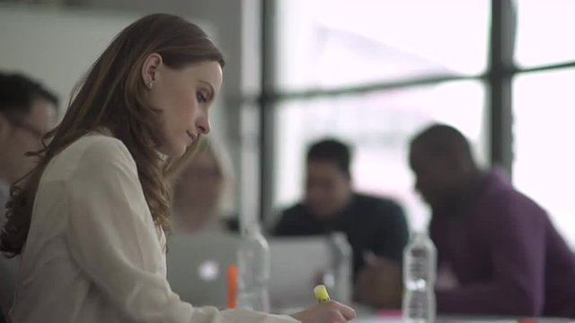 Group of attractive professionals involved in meeting