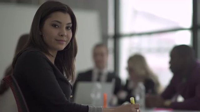 Group of attractive professionals involved in meeting