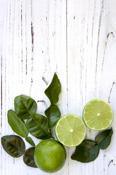 Kaffir Lime Leaves and Fruit Food Background