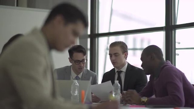 Group of attractive professionals involved in meeting