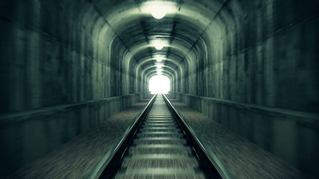 Ride through old looking rail tunnel with a shining light at the end. HD