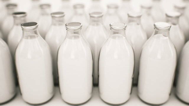 Endless animation of bottles with natural milk infinite array. Loopable. HD