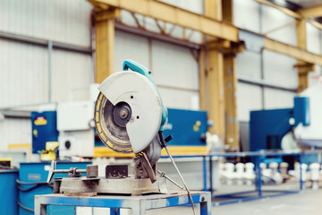 Asian worker in production plant on the factory floor