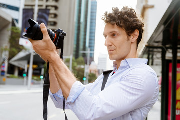 Male photographer taking picture