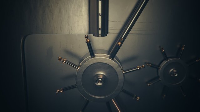 A solid metal gate used by bank to protect and secure all of the stored deposit.