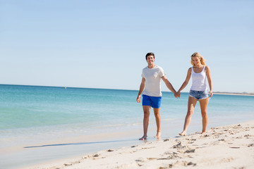 Romantic young couple on the beach