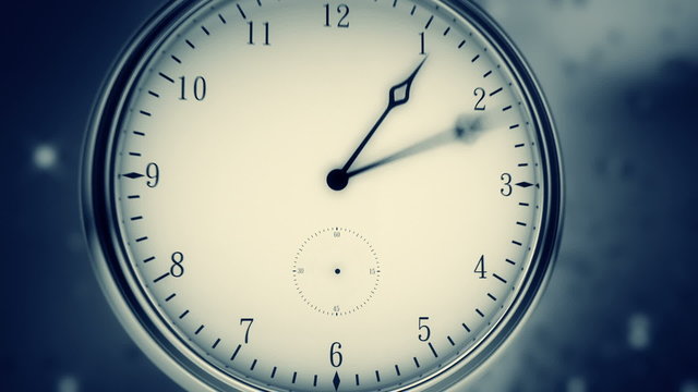 Time-lapse animation of a clock with the fast turning hand of clock. Closeup. HD