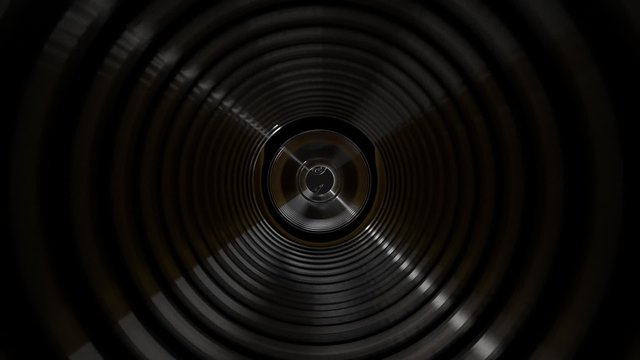 Close-up on the shiny hard drive disk platters. They are gathering binary data.