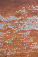 Weathered brown painted wooden board