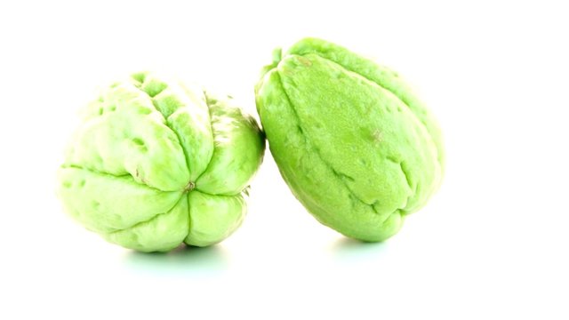 Chayote also known as chow chow and Chu Chu isolated on white.