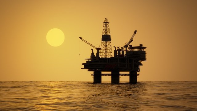 The oil rig uses machines, drills and pipes to extract gasoline and petroleum.