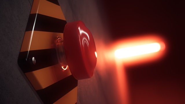 Close up of a big red vintage button during a dangerous emergency situation.