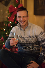 young man with champagne glass  on party