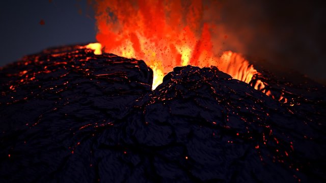 Active volcano eruption. Volcanic crater throws away glowy orange fireballs