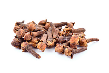 dry cloves on white background