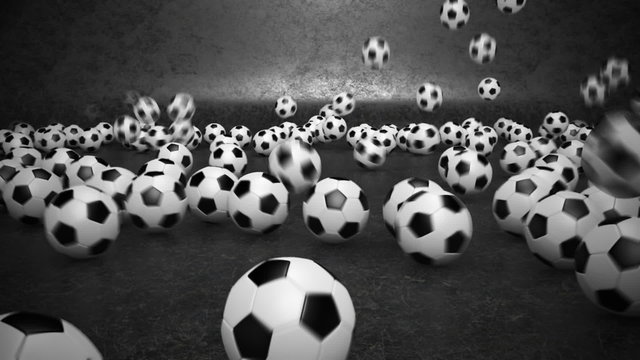 Mini white-black soccer balls bouncing invasion in dark gray environment. HD