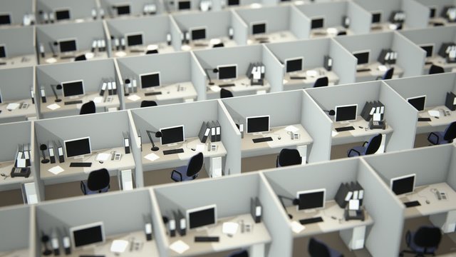 Aerial view of empty office cubicles with computer workstations