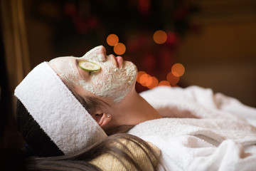 woman in spa  with cosmetic mask