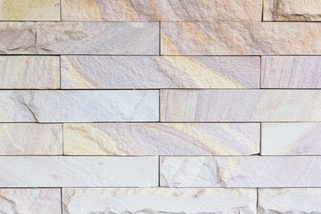 Modern stone brick wall background.