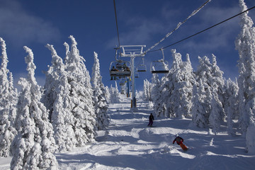 Fototapeta na wymiar Ski Resort Terrain on Sunny Day