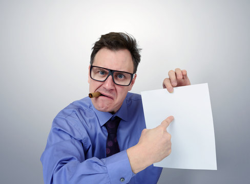 Businessman in glasses holding a paper. You signed contract concept.