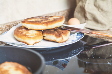 Three delicious donuts on plate